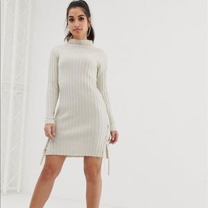 Ribbed high neck sweater dress with tie detail